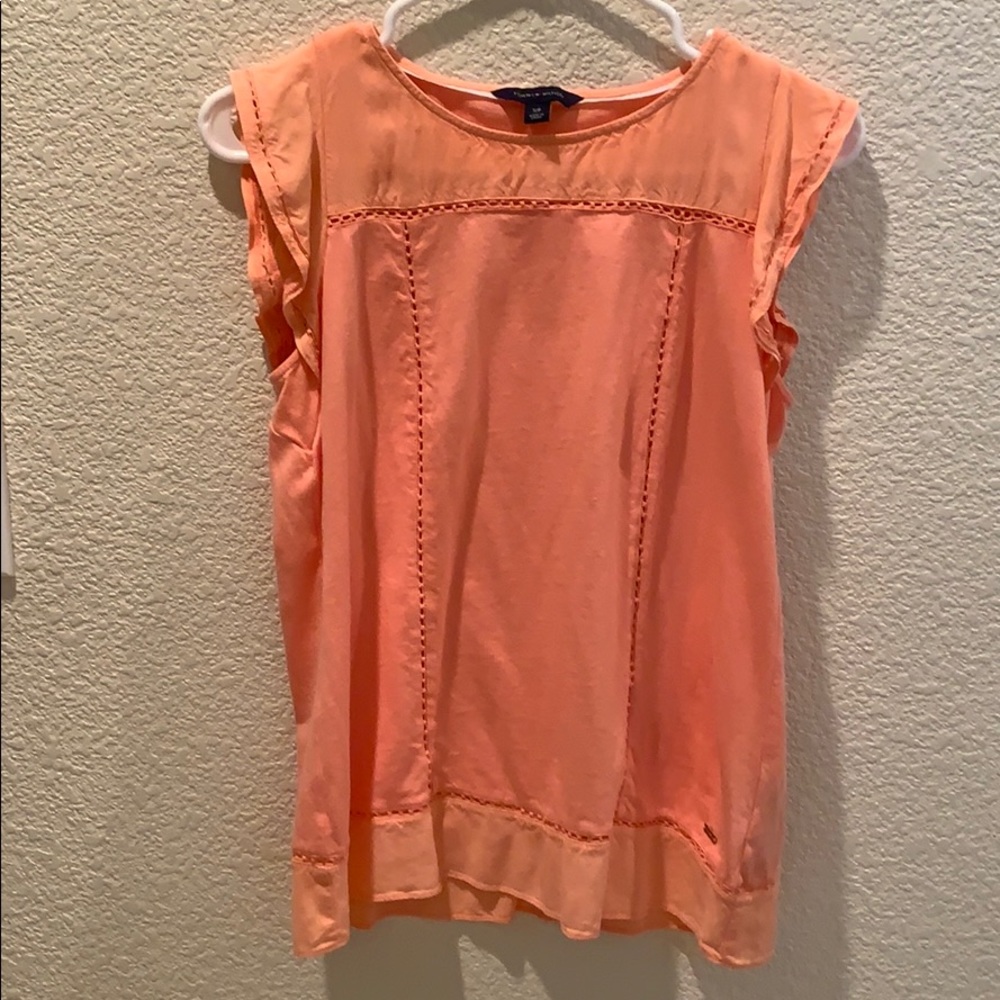 Peach-colored top.